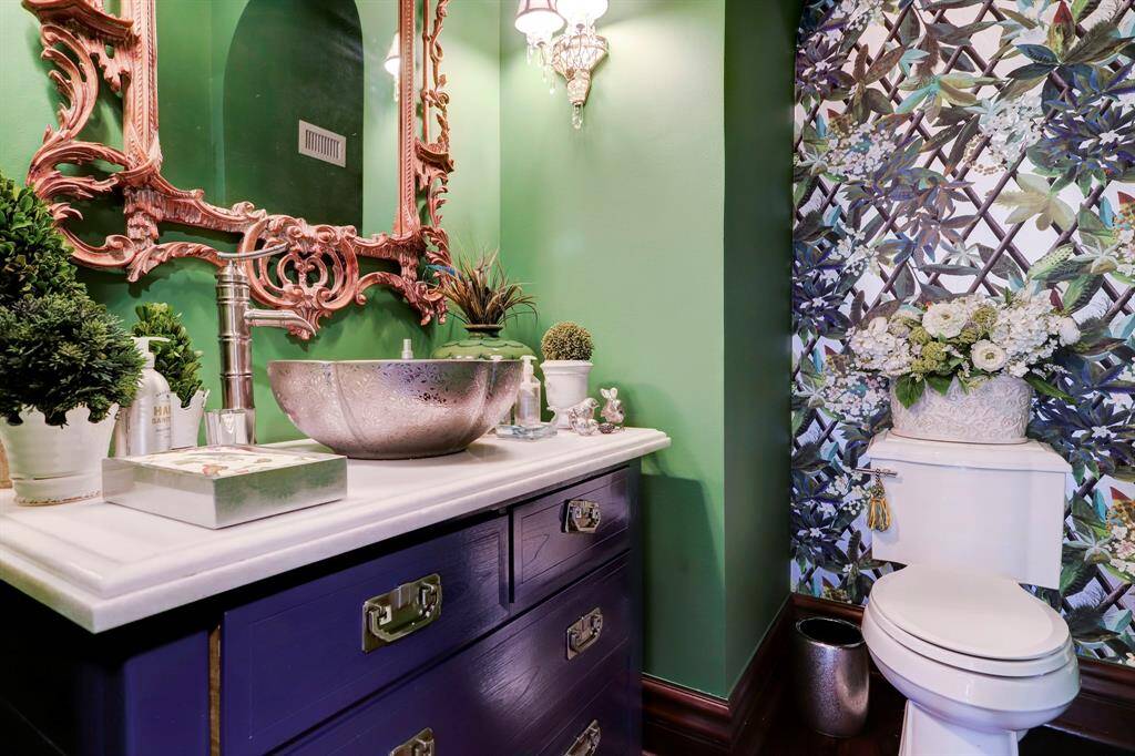 Impressive Formal Powder Room with Christian Lacroix Canopy Saphir Wallpaper.