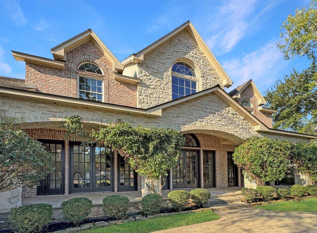 Amazing front porch with French doors that open.