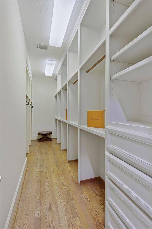 Spacious walk-in closet #1