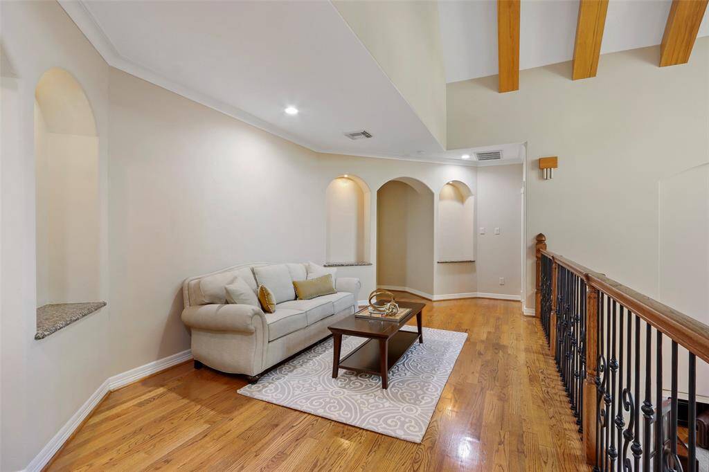Upstairs sitting area overlooking the grand entryway.