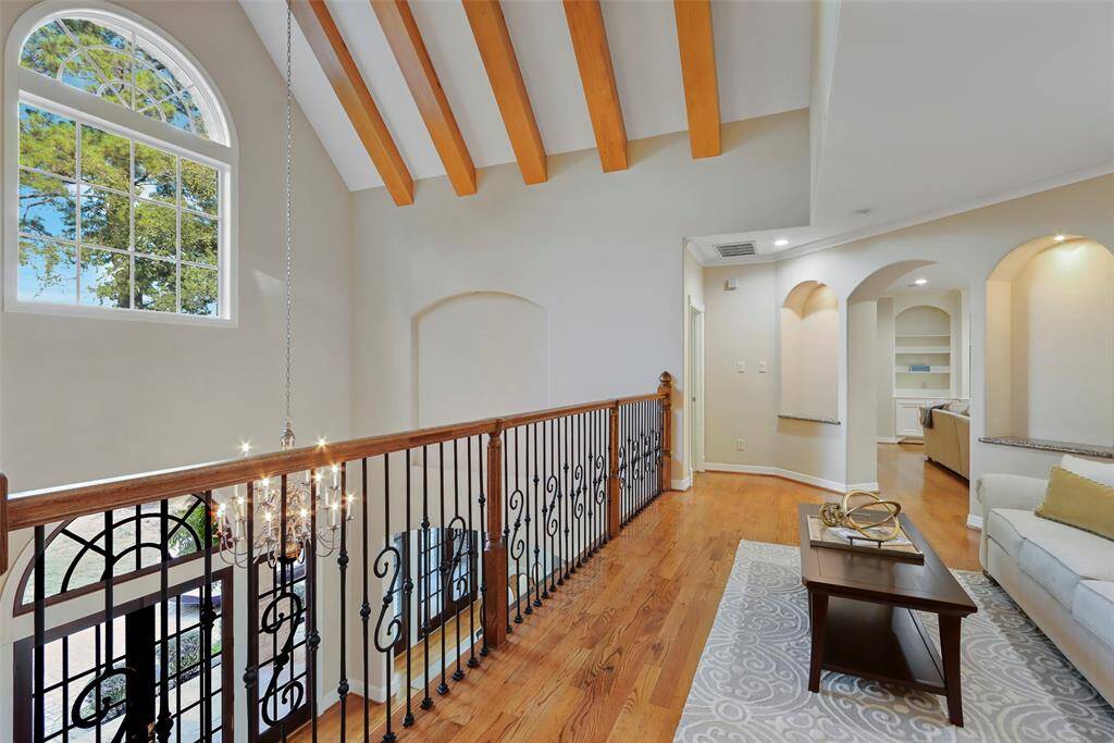 Upstairs sitting area overlooking the grand entryway.