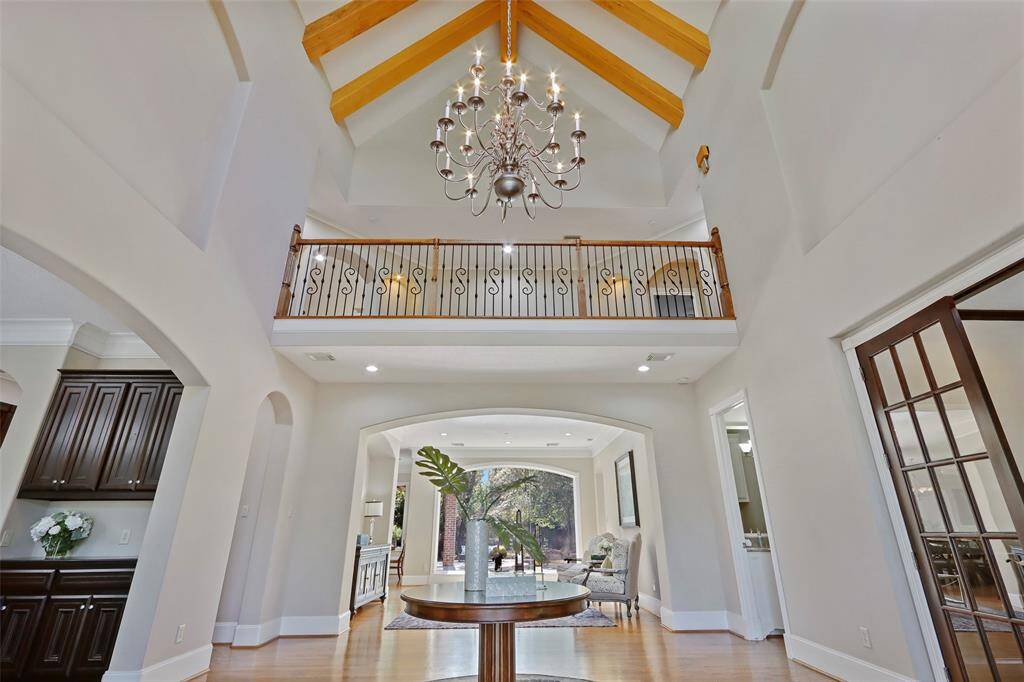Spectacular entryway with valued ceiling and amazing chandelier