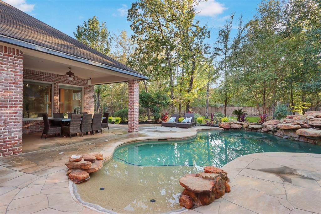Beautiful covered patio and pool area.