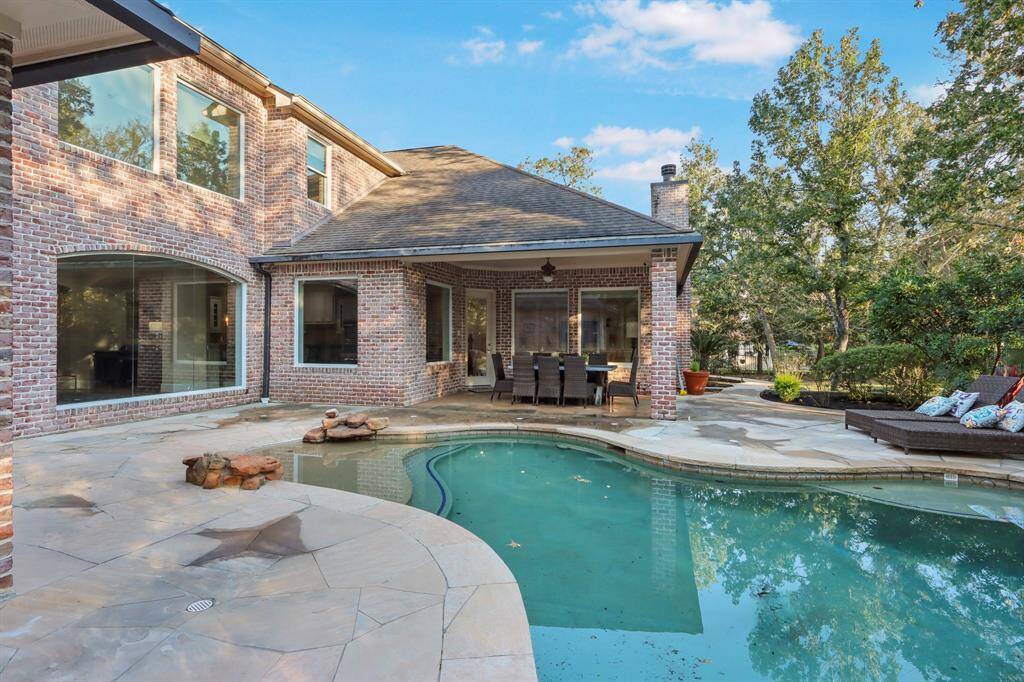 Beautiful covered patio and pool area.