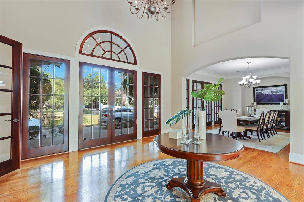 View of front entry and dining room.