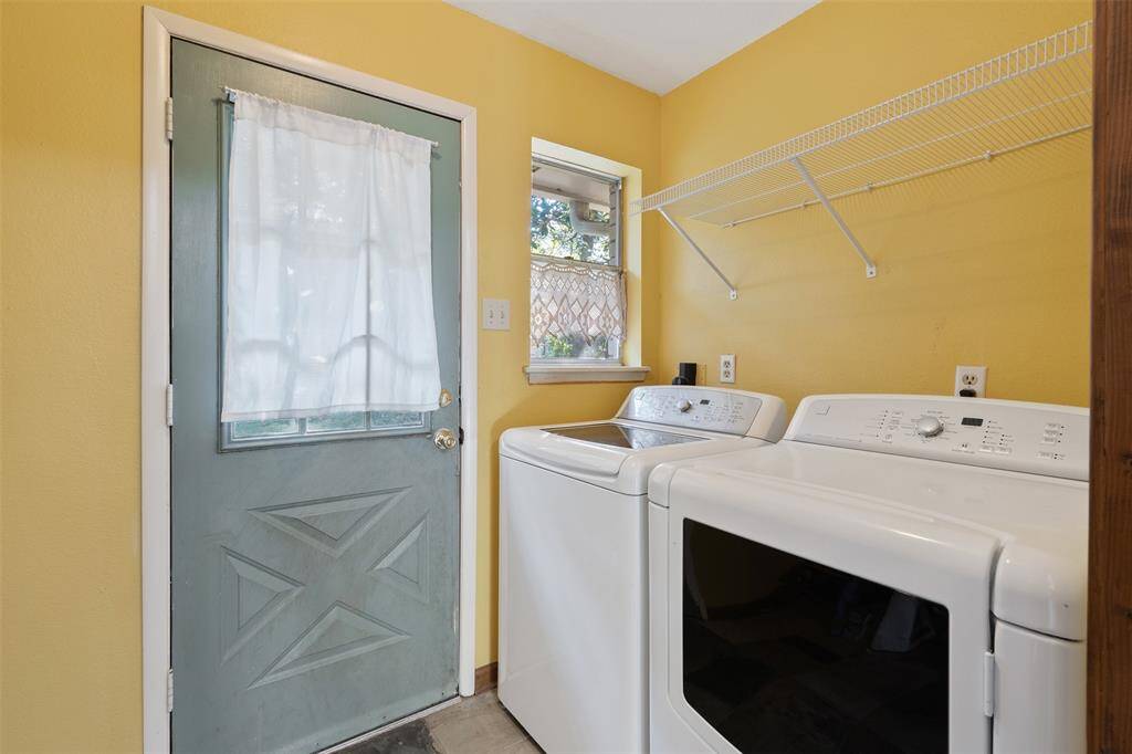 Storage above the w/d exterior doorway with plenty of light!  Nice and bright.