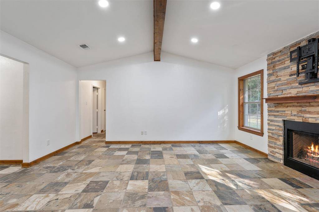 Another view of the room.  Look at the detail in the fireplace and tile. Virtual Fire in fireplace.