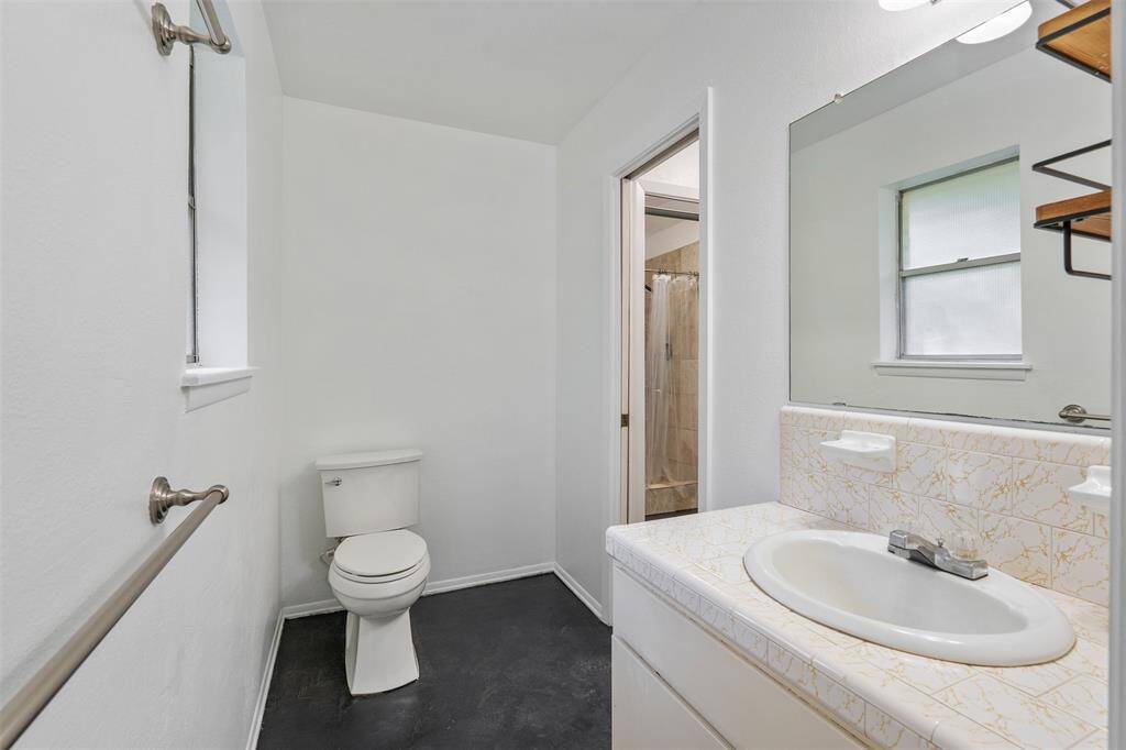 Half bathroom (Hollywood style) coming from the primary room.
