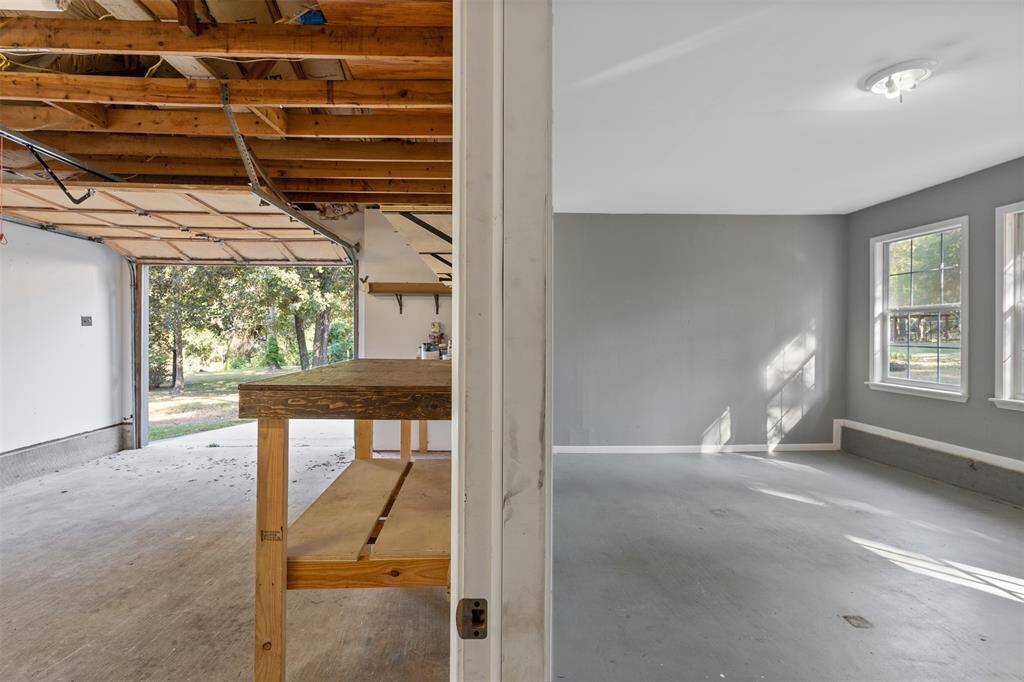 Here is a split view from the doorway going from the conversion into the garage.