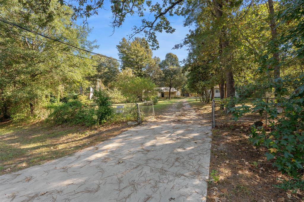 Here is the view from the street  looking up the driveway thru the gate.
