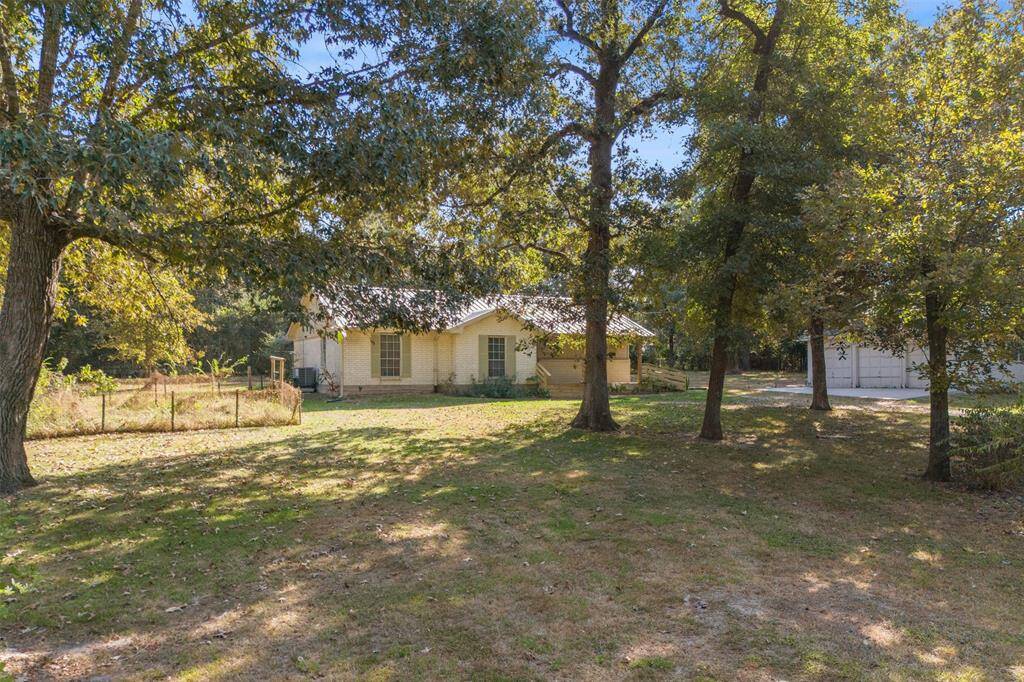 Nice tall trees all around!  Don't miss your opportunity to get back in touch with nature.  Only minutes from Lake Conroe, Sam Houston National Forest, and the charming and history Montgomery! Call now for a showing.