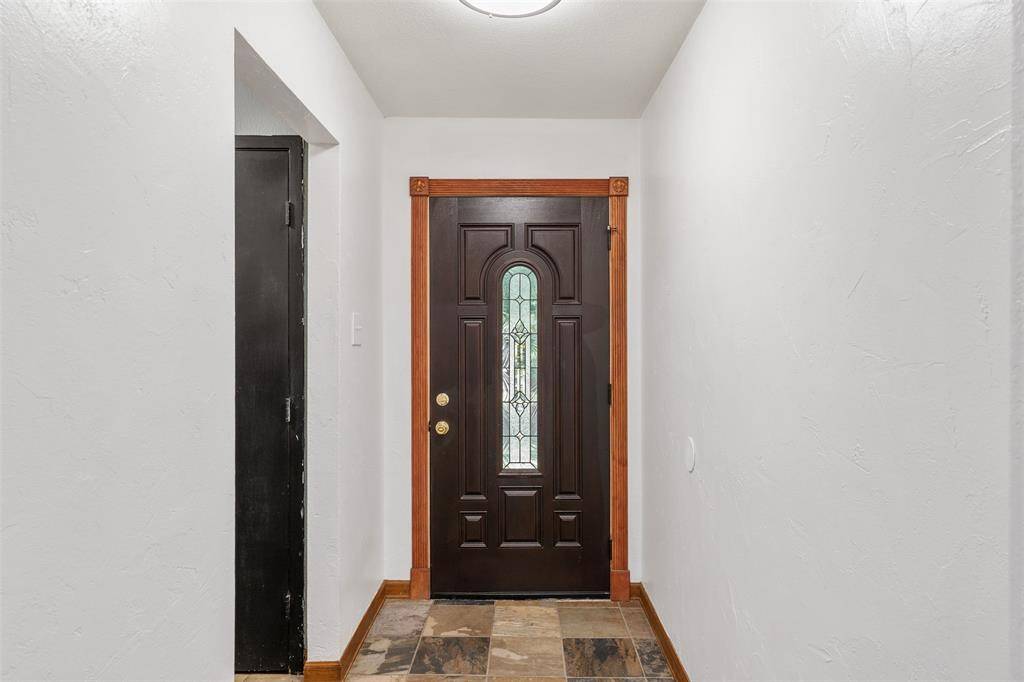 Looking back at the doorway and foyer.
