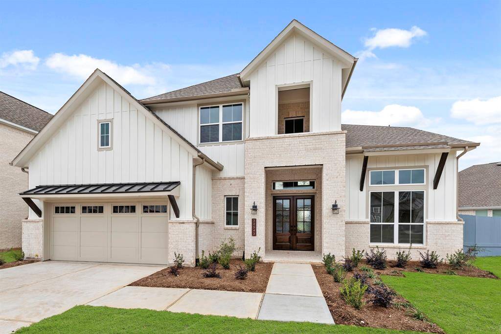 MOVE IN READY!! Westin Homes NEW Construction (Asher IX, Elevation AF) Two story. 5 bedrooms. 4.5 baths. Green grass added to enhance photo.