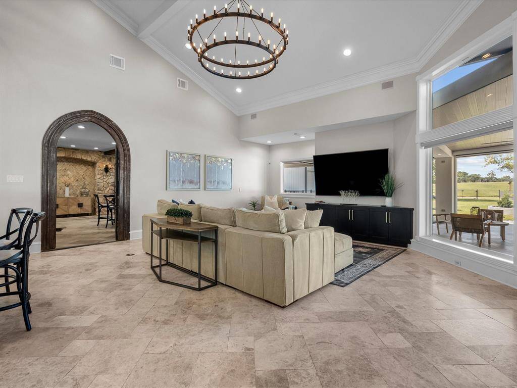 Seamless open-concept living space adjoining the kitchen.