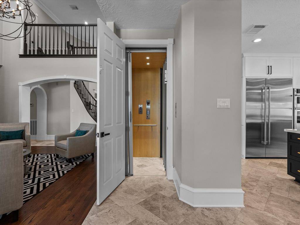 Private in-home elevator for effortless access between floors.