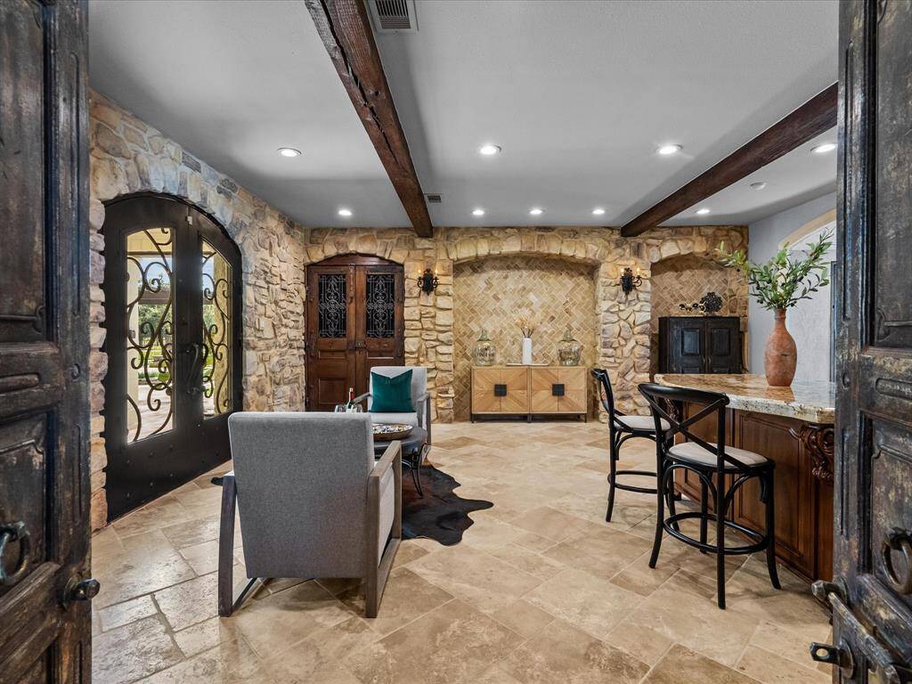 Intimate and luxurious wine room, perfect for the connoisseur seeking elegance and charm.