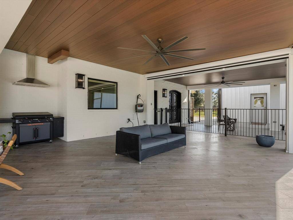 Spacious covered patio for versatile outdoor living.