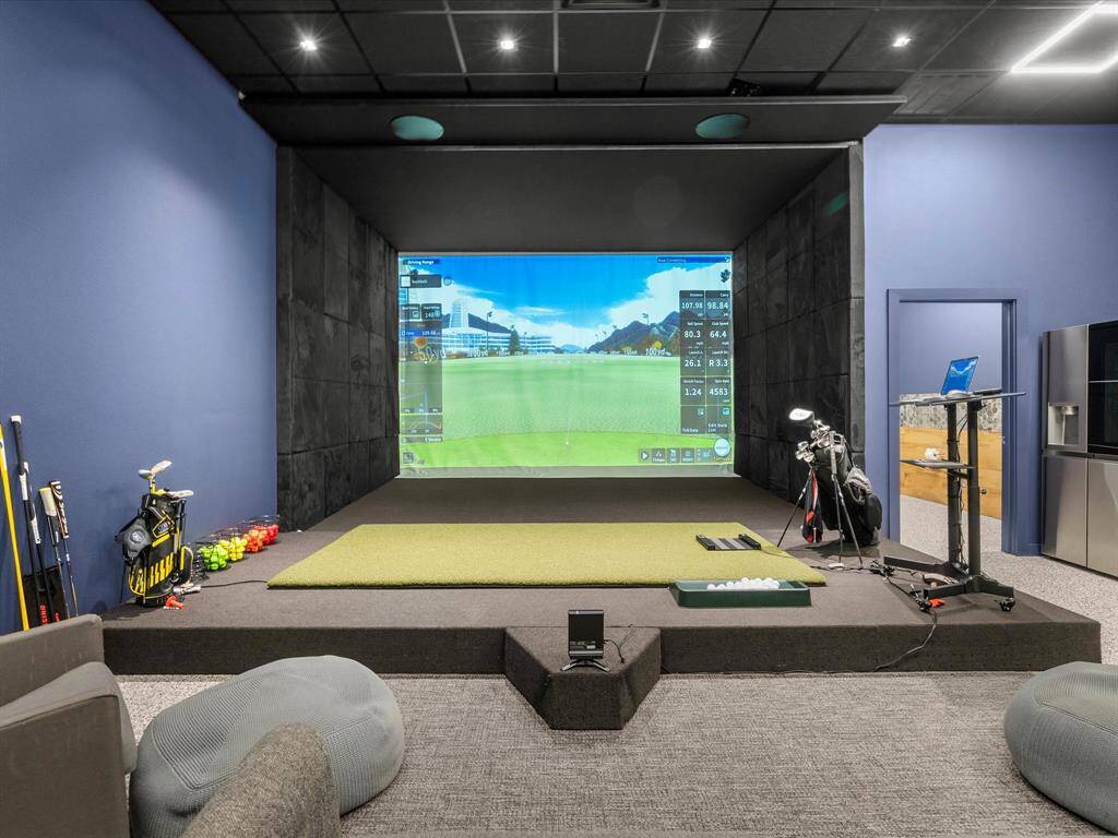 Enhanced Entertainment Room with State-of-the-Art Golf Simulator