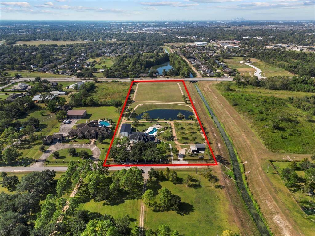 Captivating bird's-eye view of the expansive property, showcasing its grandeur and prime location.