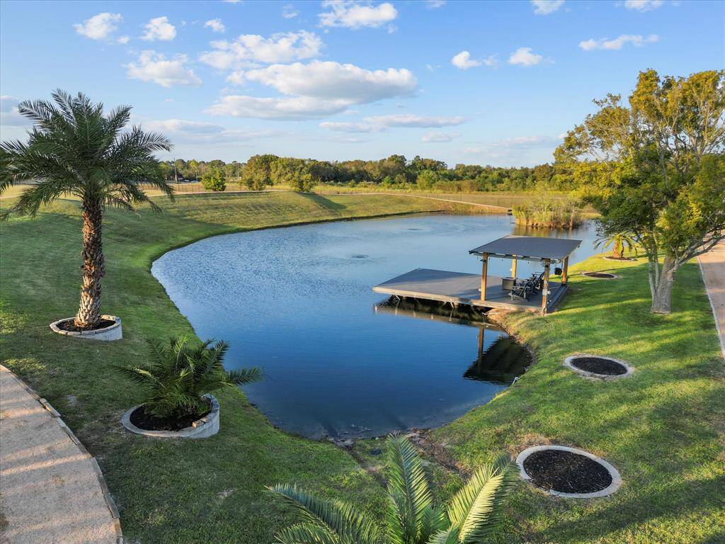 Scenic pond with bespoke decking area.