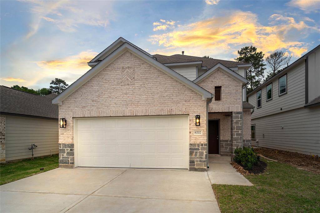 Welcome home to 6702 Old Cypress Landing Lane located in the community of Cypresswood Landing and zoned to Aldine ISD.