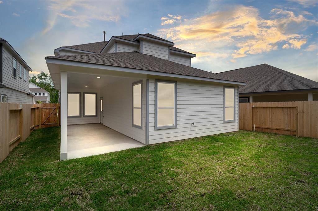 Come and see this spacious backyard with its beautiful covered patio. There is plenty of room for the kids to play and adults to relax! Perfect for your outdoor living space, patio furniture, bbq pit, and so much more. The possibilities are endless!