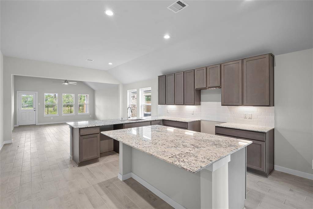 This photo is for illustrative purposes only and is not to be considered an exact replica of the finished home. Rendering does not match the finished product in terms of features, colors, landscaping, etc. Pricing, specifications, square footage and materials are subject to change at any time and without notice.