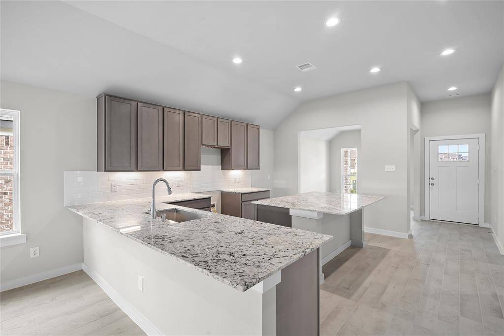 This photo is for illustrative purposes only and is not to be considered an exact replica of the finished home. Rendering does not match the finished product in terms of features, colors, landscaping, etc. Pricing, specifications, square footage and materials are subject to change at any time and without notice.