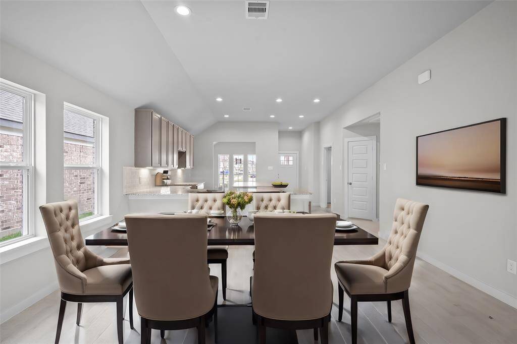 This photo is for illustrative purposes only and is not to be considered an exact replica of the finished home. Rendering does not match the finished product in terms of features, colors, landscaping, etc. Pricing, specifications, square footage and materials are subject to change at any time and without notice.