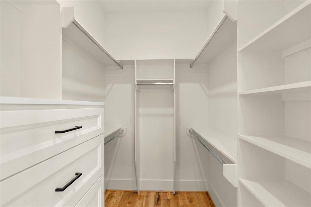One of two owners closets, generous drawers as well as  shelf spaces