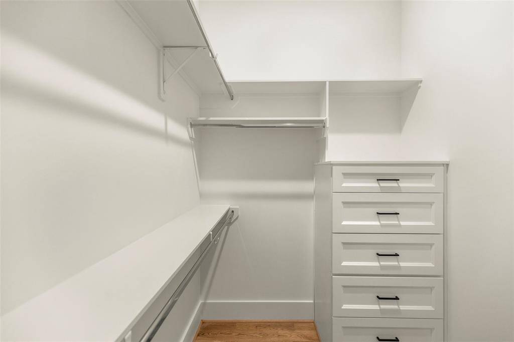 notice the custom built ins added to this second closet