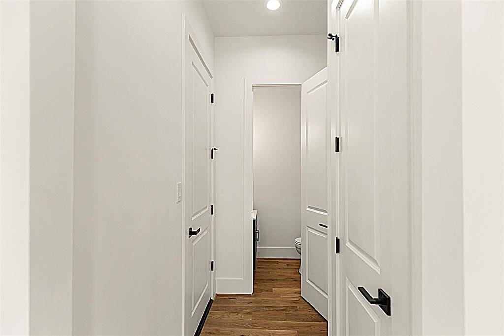 Tasteful first floor powder room, as well as a very spacious/functional laundry center.