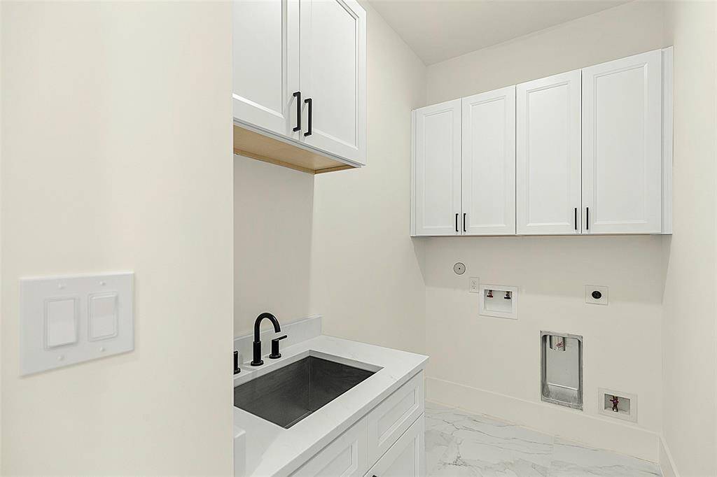 upgraded cabinets in the  first floor  laundry