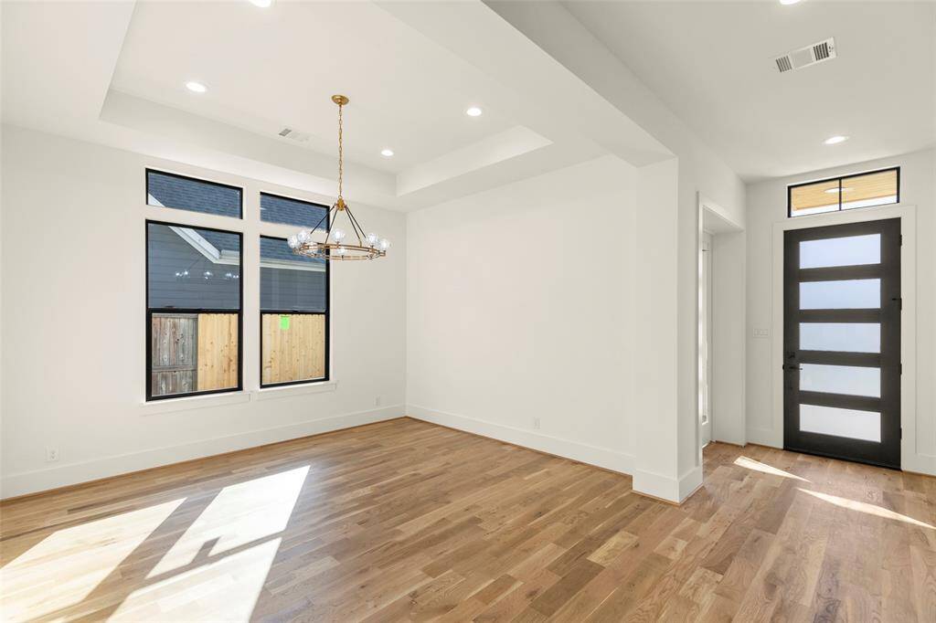 Looking back from foyer to premium 8 foot doors, not shown is the private study to the left of front door