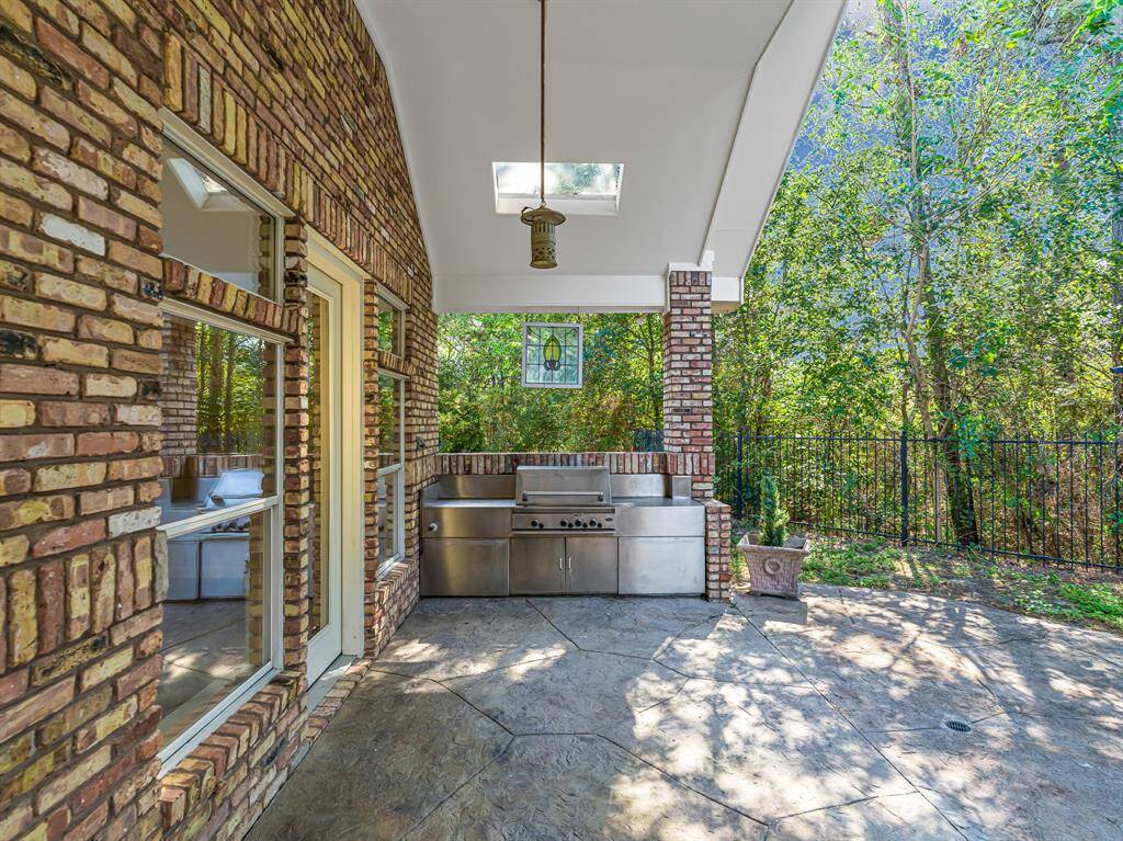 Outdoor kitchen area with grill