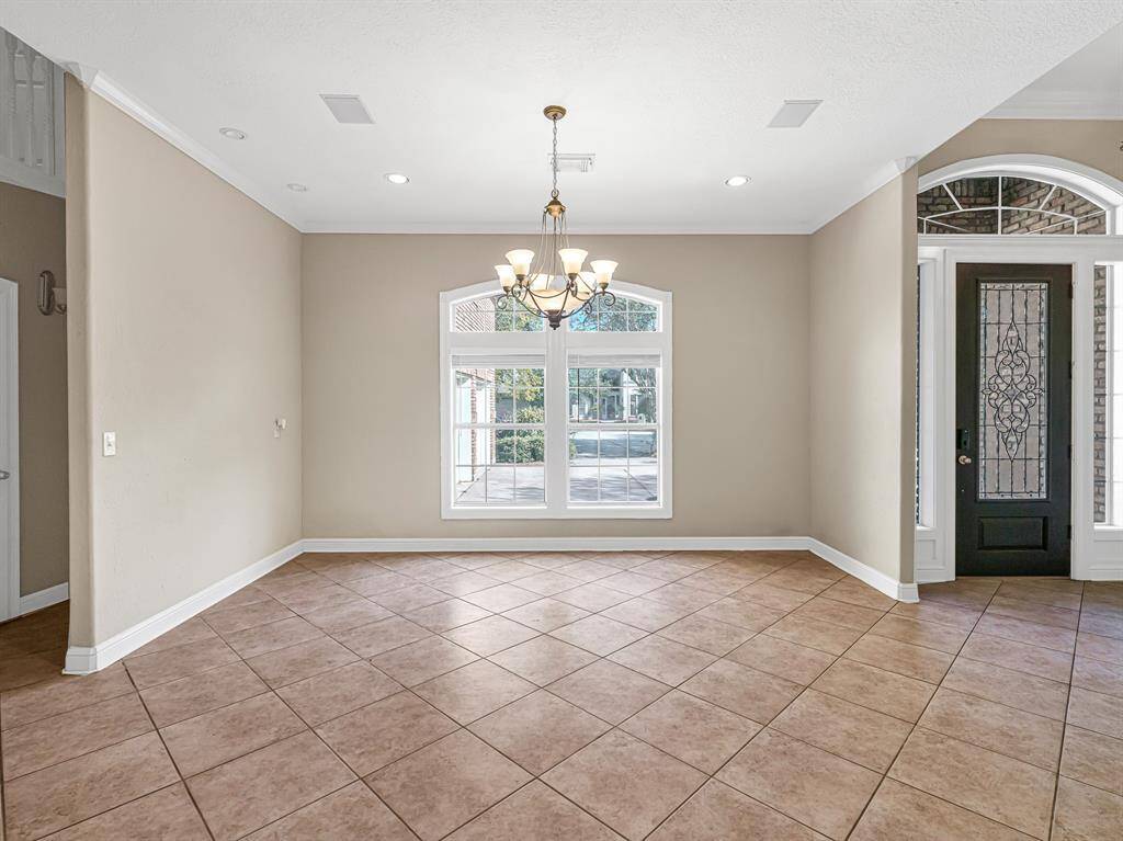Formal dining room as you enter the home