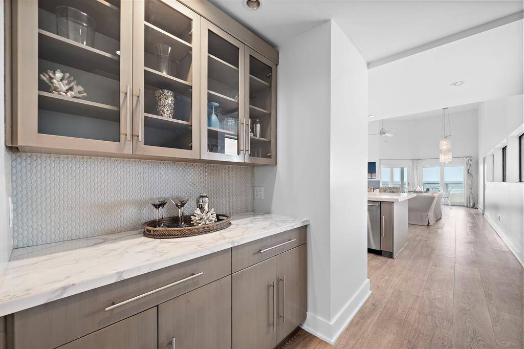 There is plenty of space to prepare drinks and store all of your favorite beverages in the dry bar.