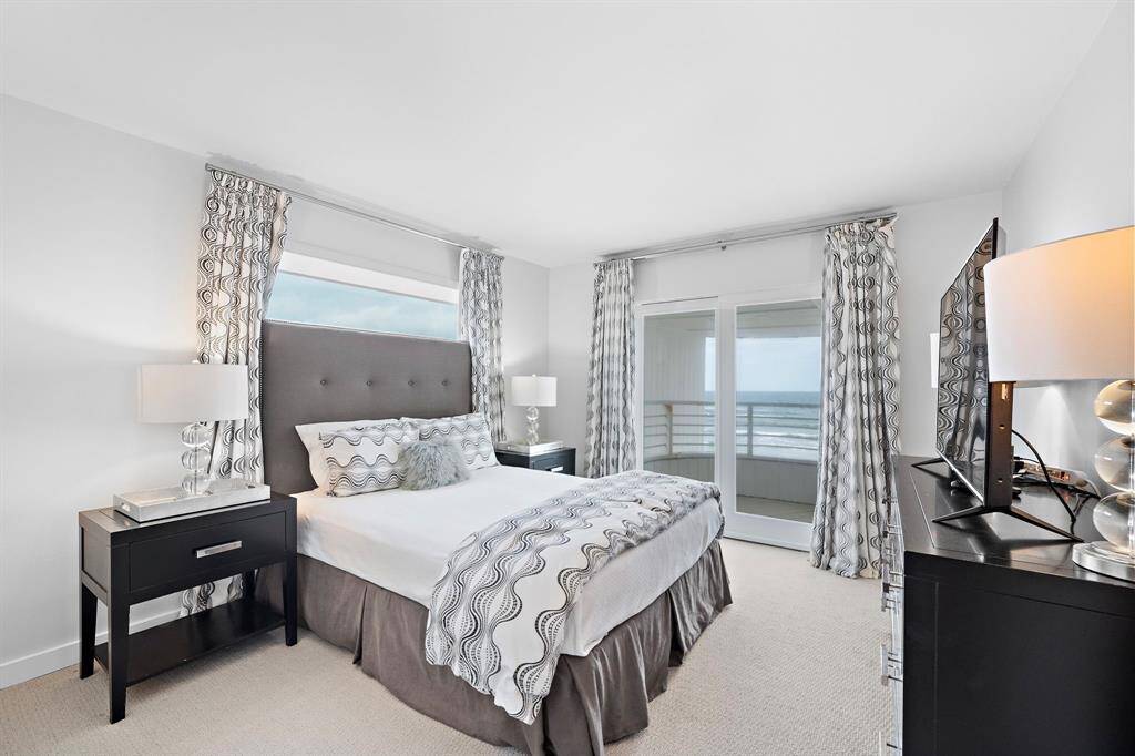 First of four bedrooms, all of which open up to the outdoors with solid high impact doors.