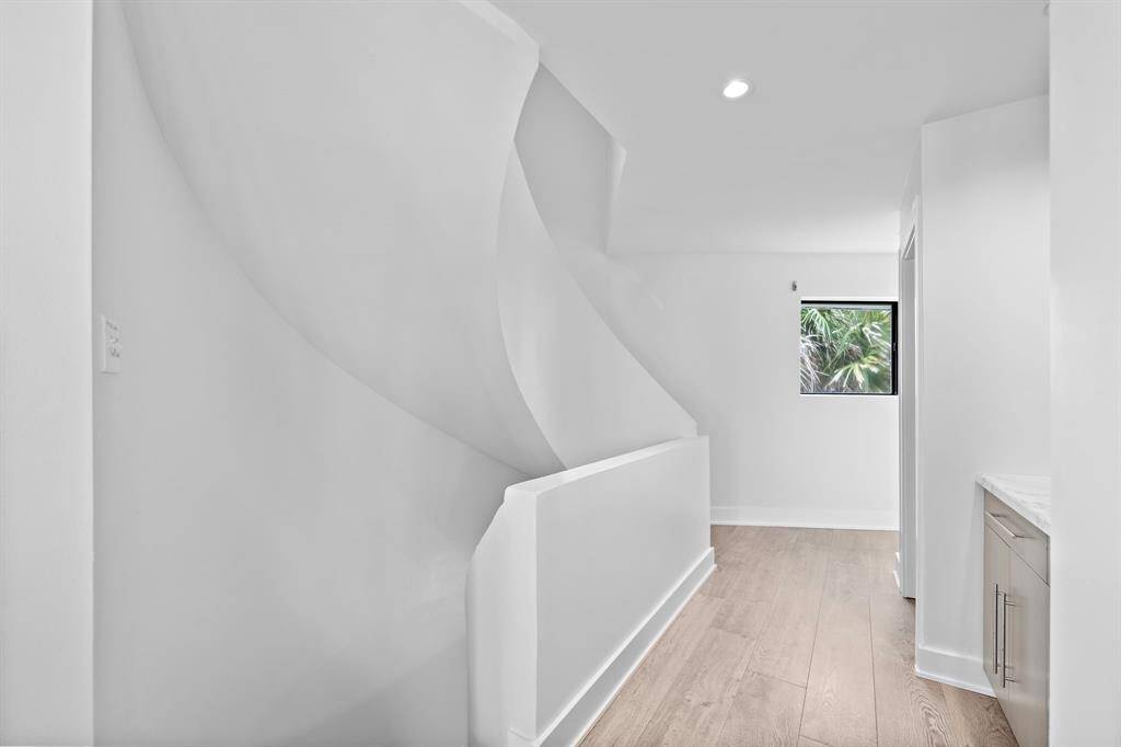 the fine curves of this home are like a work of modern art.