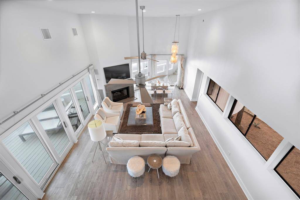 View onto the main living area on the second level reveals the open air feel and spectacular views.