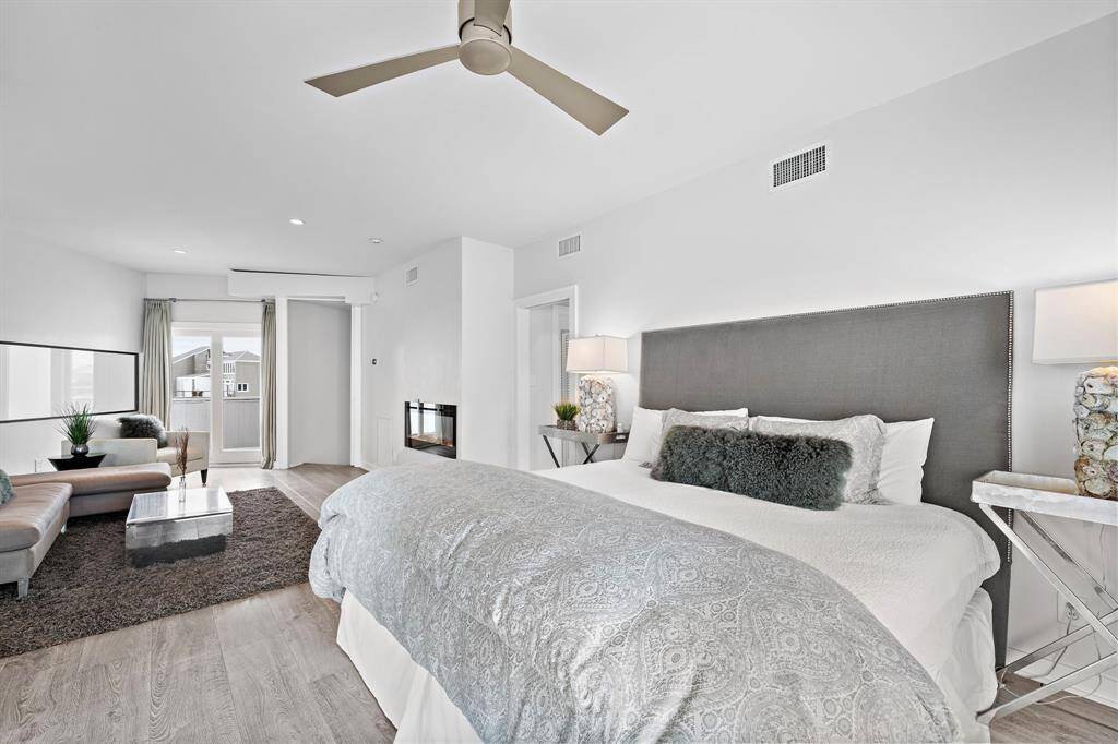 Expansive primary bedroom suite will have you wanting to stay in this home 365 days a year.