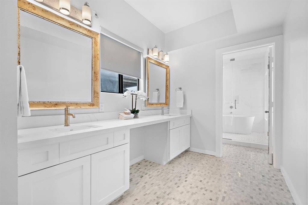 Marble countertops and sparkling ornamental floors give this room the feeling of a five star hotel.