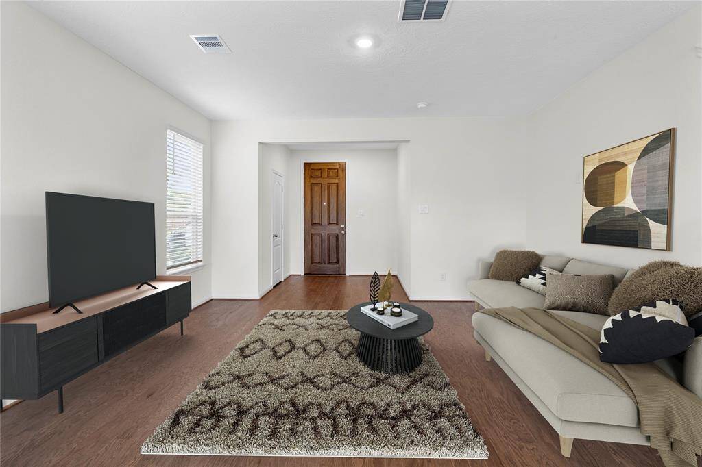 Walking into this gorgeous home, you get a feel of just how grand everything is, this space showcases high ceilings, recessed lighting, open spaces and fluid floor plan, custom paint for a cooling feel, a wide entryway, and gorgeous vinyl plank floorings! This home is absolutely beautiful!