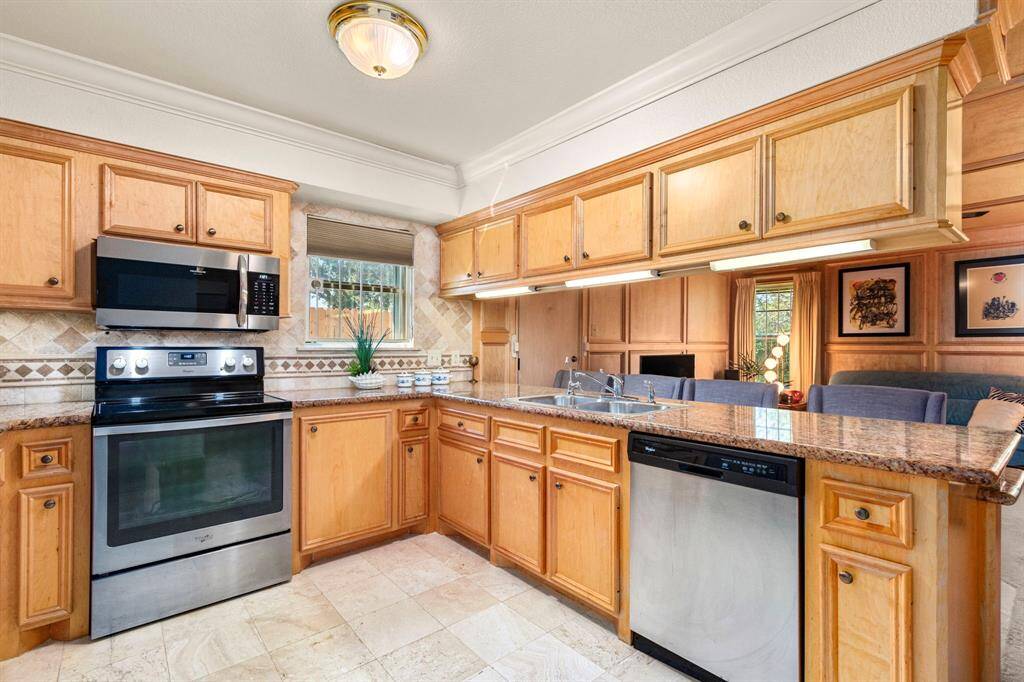 Under cabinet lighting and places for your guests to sit and visit while you cook