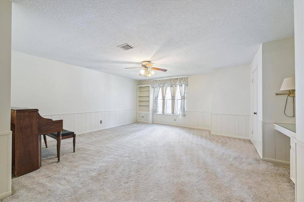 Upstairs game room perfect for entertainment and relaxation.