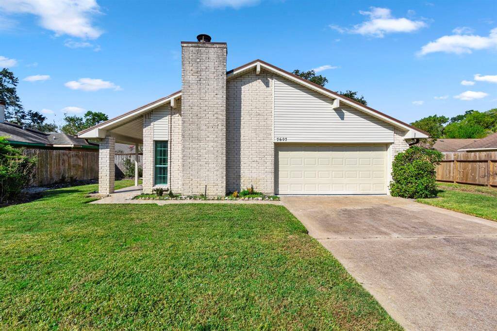 Amazing metal roof and brick construction, recent siding and trim too.
