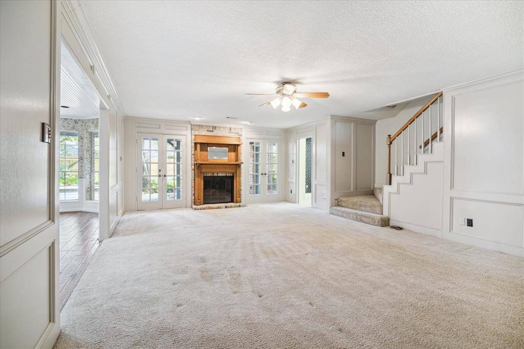 Discover expansive living area with a seamless flow to a private study and versatile flex room at the rear of the home, perfect for your family's needs.