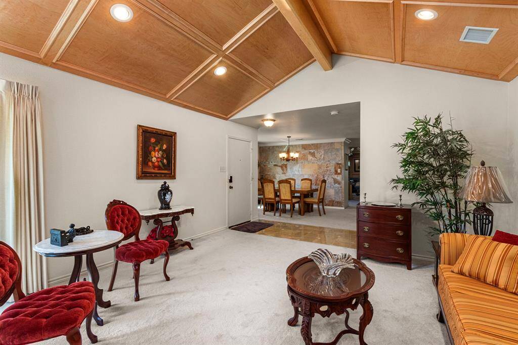 Marble tiled entryway between the formal living and formal dining.