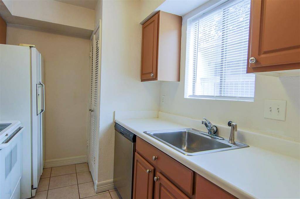 The other side of the kitchen that overlooks the pool.