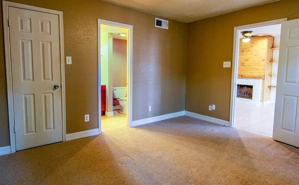 Primary bedroom with ensuite bath just off the family room.